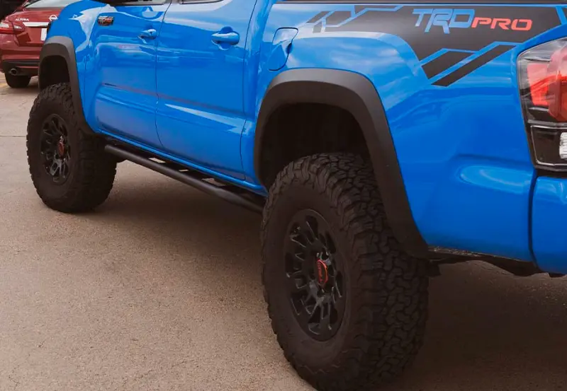 Cali Raised Trail Edition Rock Sliders For 2005–2023 Toyota Tacoma – Access Cab, Kick-Out Design, Powder-Coated 1
